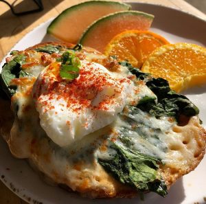 Spinach egg toast with oranges