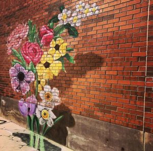 Flower mural on the side of Cary Theater